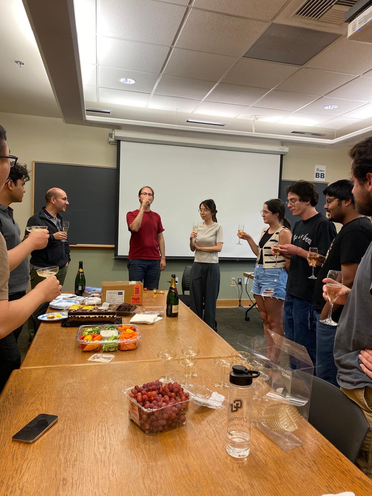 The group toasting Nanako after her PhD defense